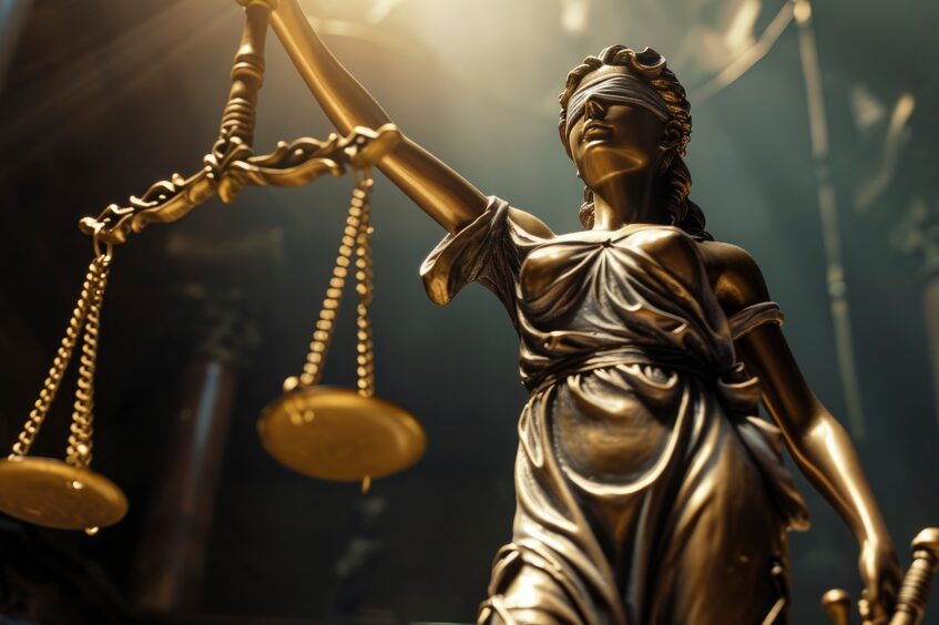 Bild der Justicia mit verbundenen Augen